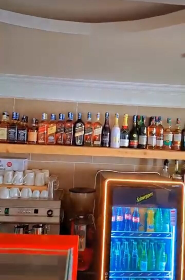 The bar shelf and coffee station at Crown restaurant